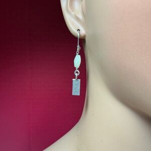 Sterling Silver Dangle Earrings with a Pale Yellow Stone. 2 inches long